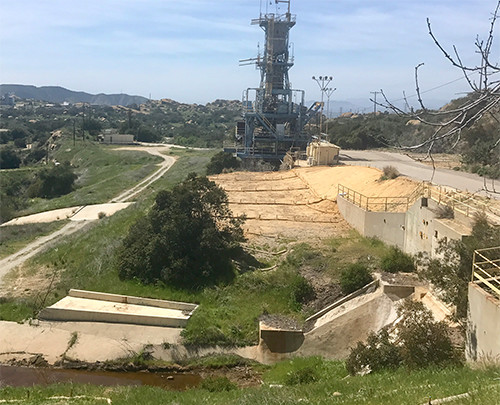 This photo is looking east from Alfa Test Stand #3 toward Alfa Test Stand #2. The structure shown and staircase in the previous photo is now gone, as is a large concrete slab.